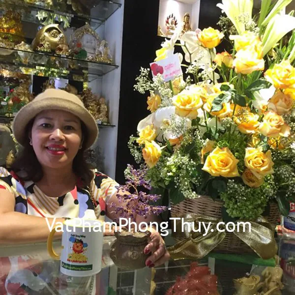 Chị Phượng-khách hàng mua cây tài lộc túi tiền chữ tài thạch anh tím KC099
